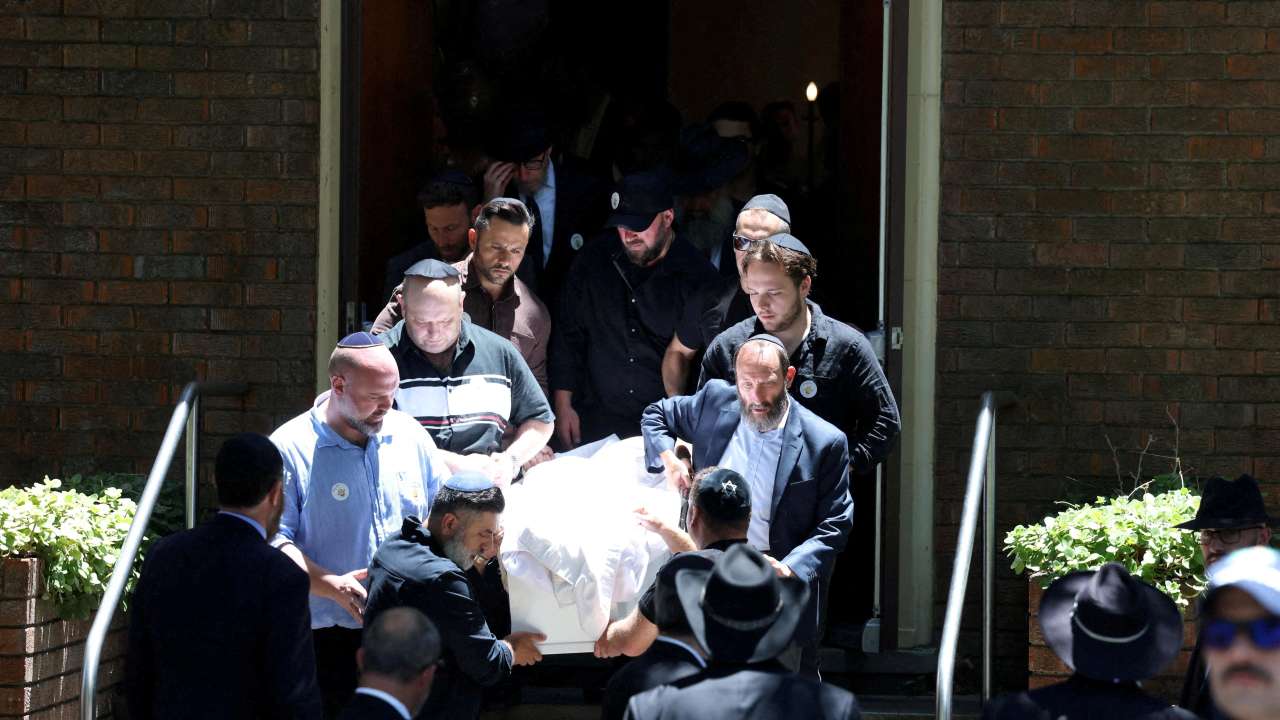Mourners carry the casket of 10-year-old Matilda the youngest victim of a mass shooting at Australia's Bondi Beach at Chevra Kadisha in Sydney
