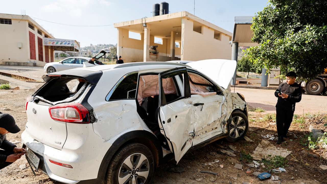 Car targeted by Israeli forces during a raid where they killed a Palestinian militant, near Tubas