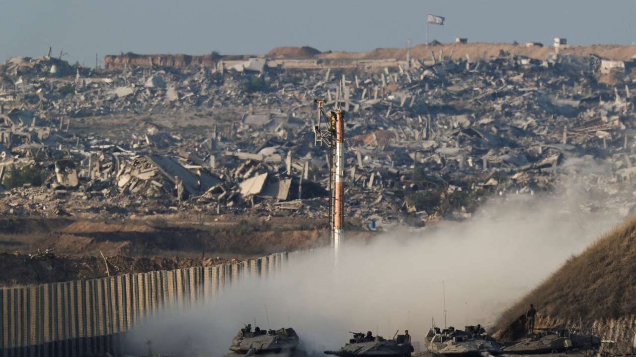Israeli tanks manoeuvre on the border with Gaza