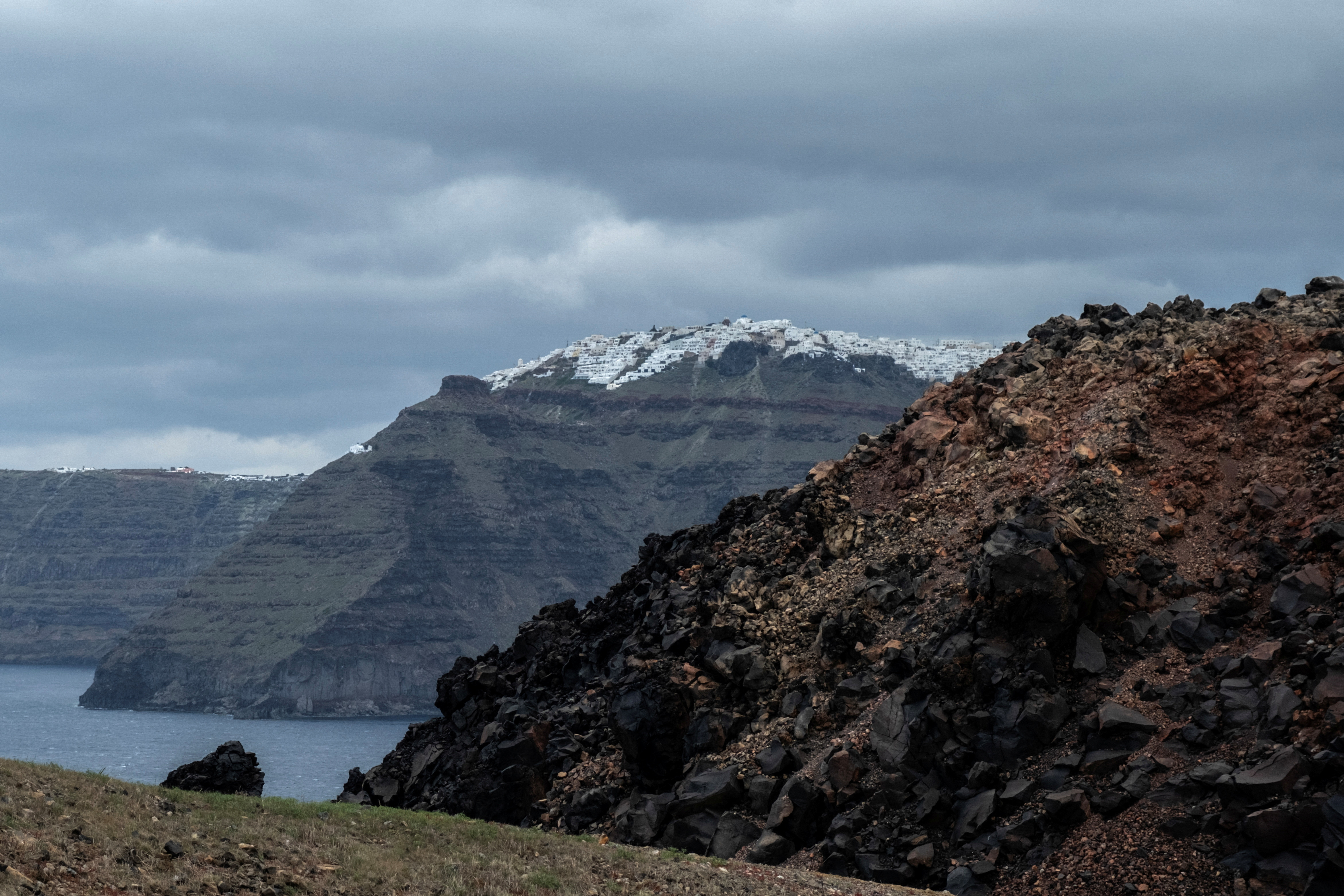 A view of Santorini as seen from the volcanic island of Nea Kameni