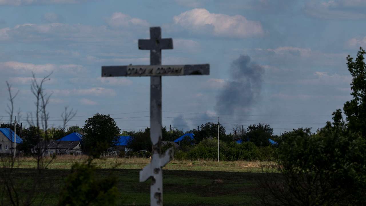 Smoke rises after a Russian military strike in the town of Lyman