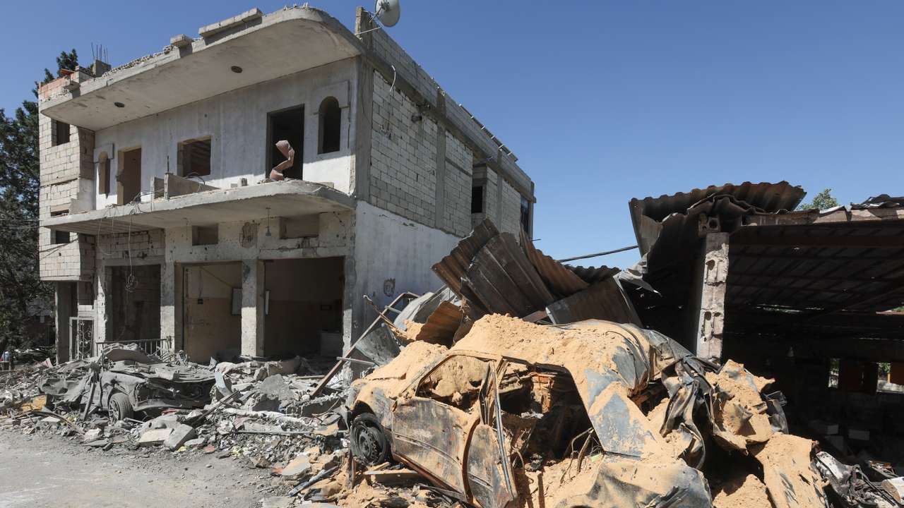A view shows a damaged building amid ongoing cross-border hostilities between Hezbollah and Israeli forces in Houla village near the border with Israel