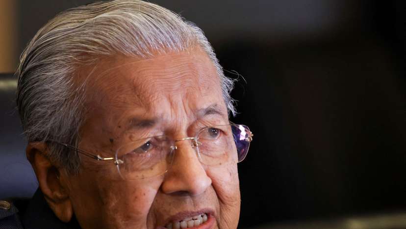 FILE PHOTO: Former Malaysian Prime Minister Mahathir Mohamad holds a press conference at Putrajaya
