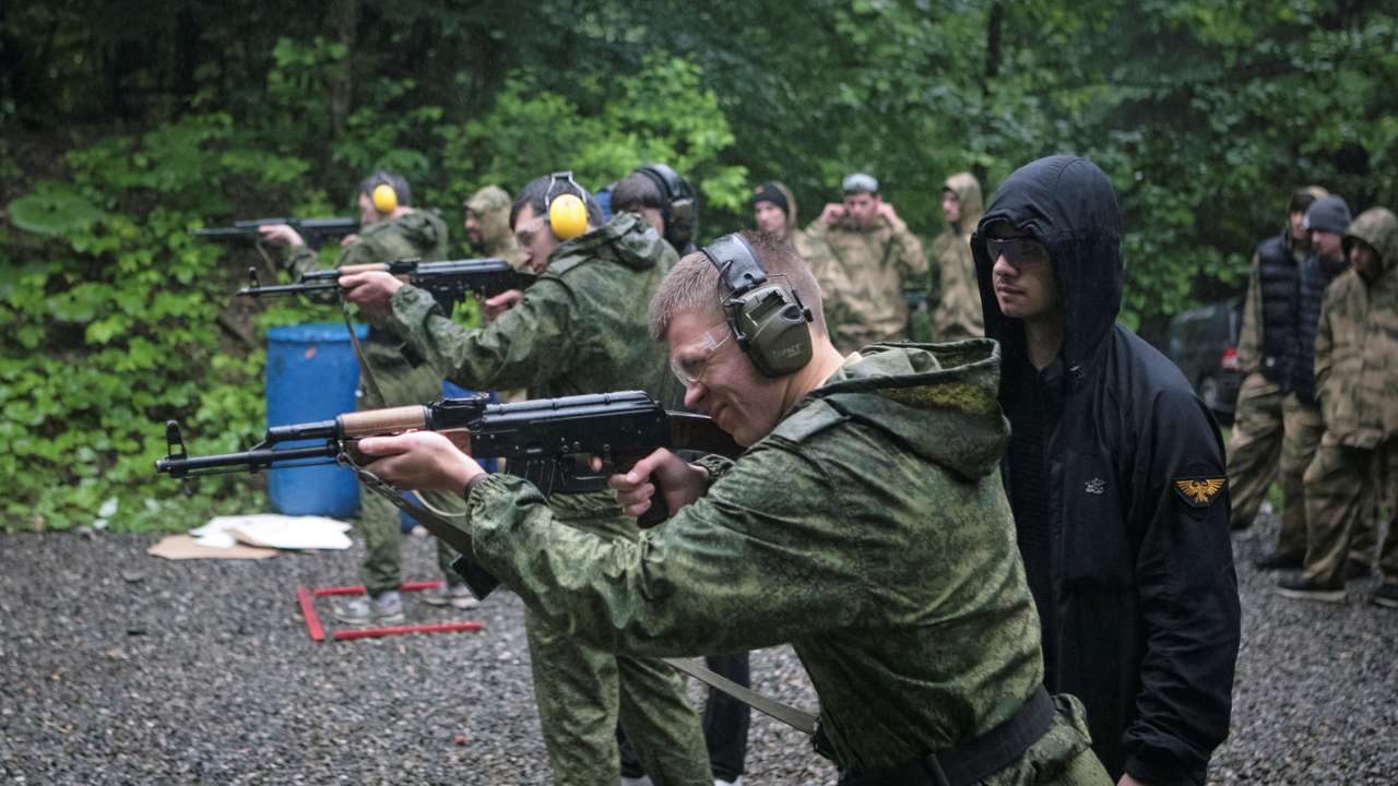 Pupils fire weapons and practise first aid at a range, in Vladikavkaz