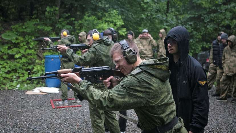 Pupils fire weapons and practise first aid at a range, in Vladikavkaz