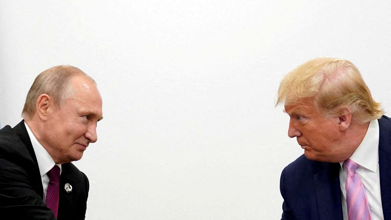 FILE PHOTO: U.S. President Donald Trump and Russian President Vladimir Putin at G20 leaders summit in Osaka