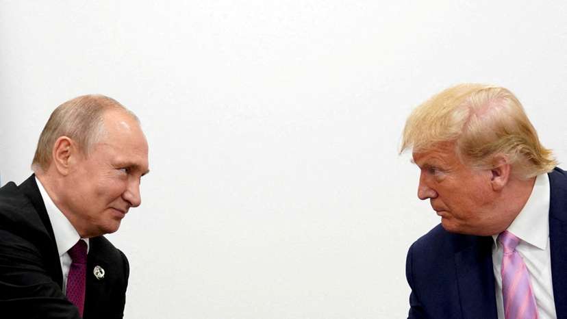 FILE PHOTO: U.S. President Donald Trump and Russian President Vladimir Putin at G20 leaders summit in Osaka