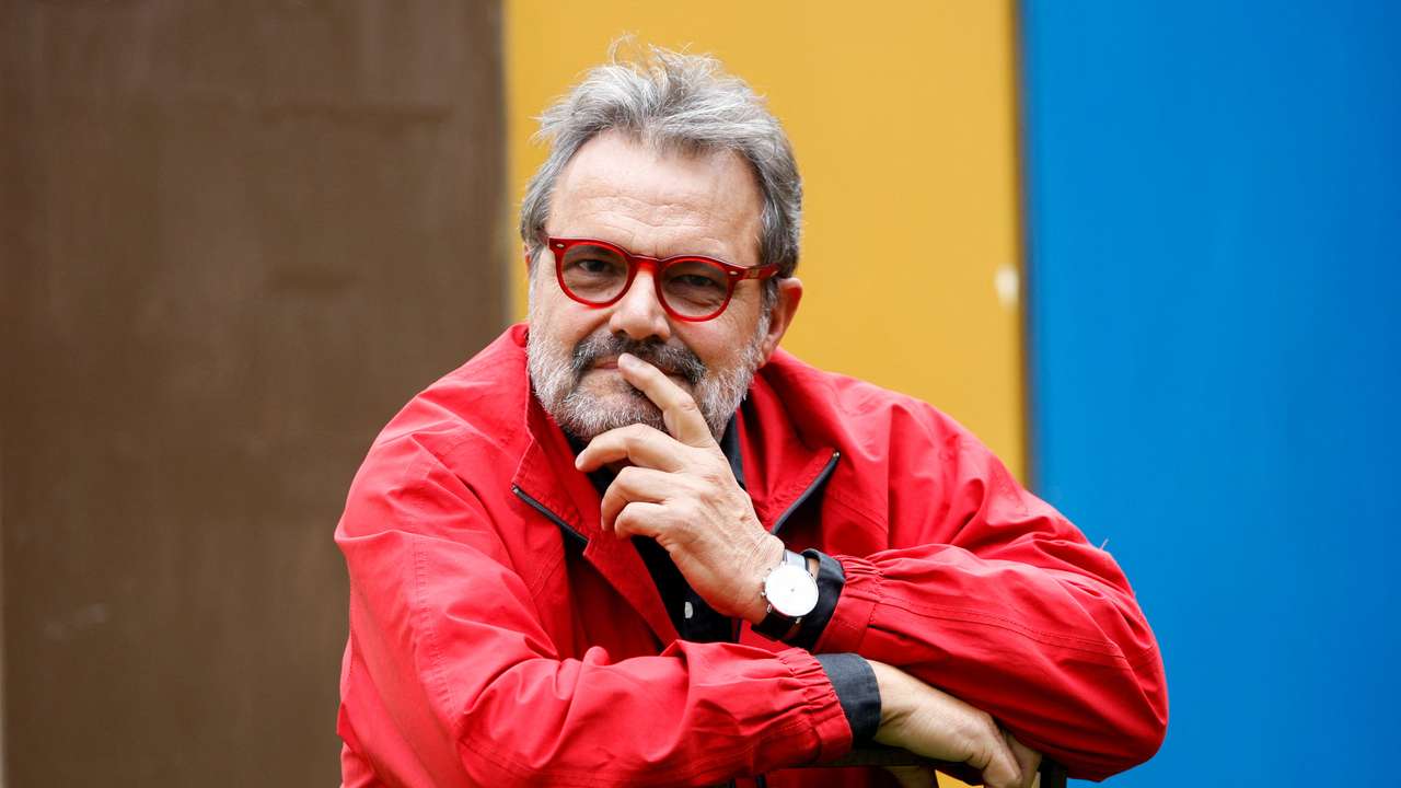 FILE PHOTO: Photographer Oliviero Toscani poses for photographers in Rome