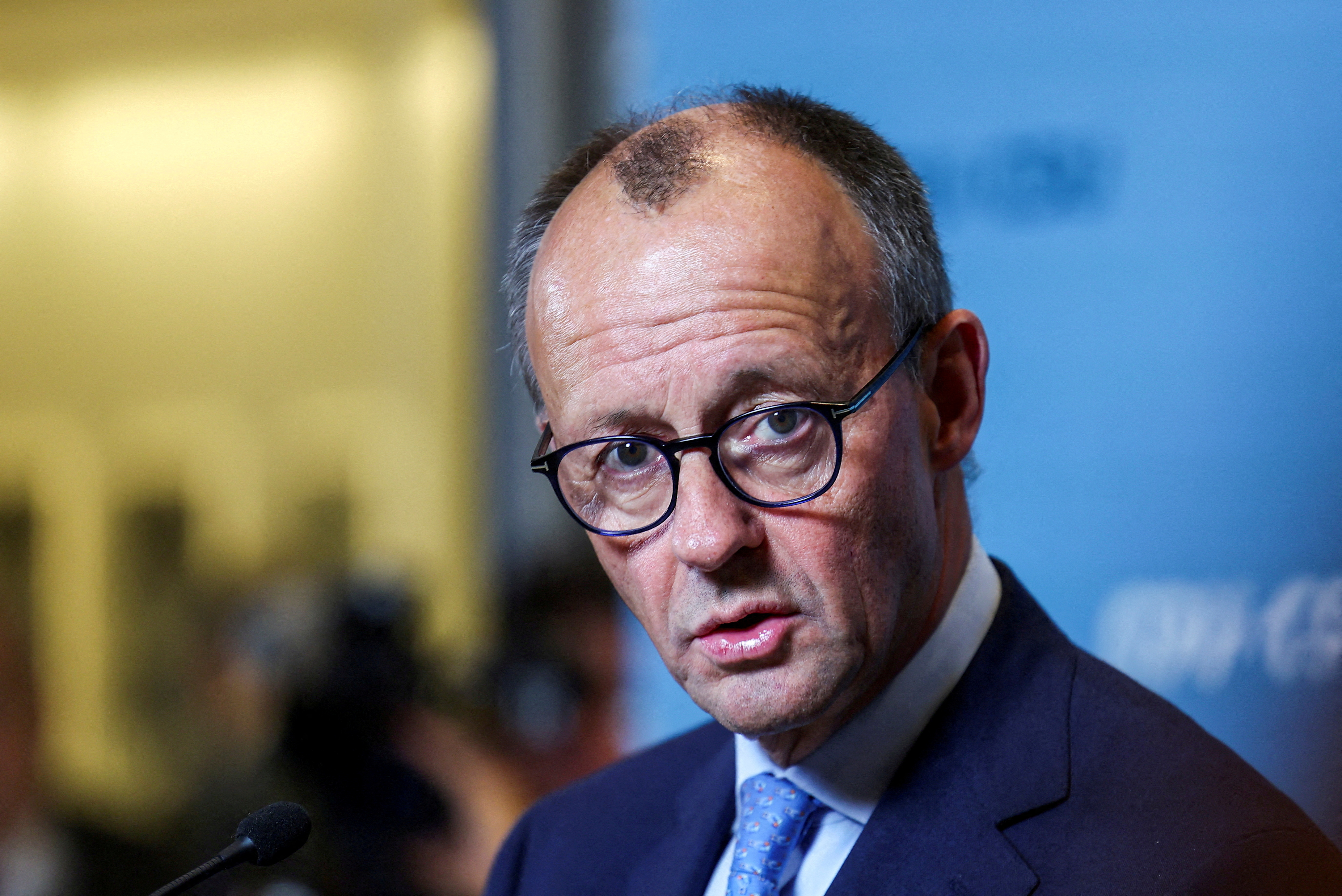 FILE PHOTO: German opposition leader Friedrich Merz of the Christian Democratic Union party