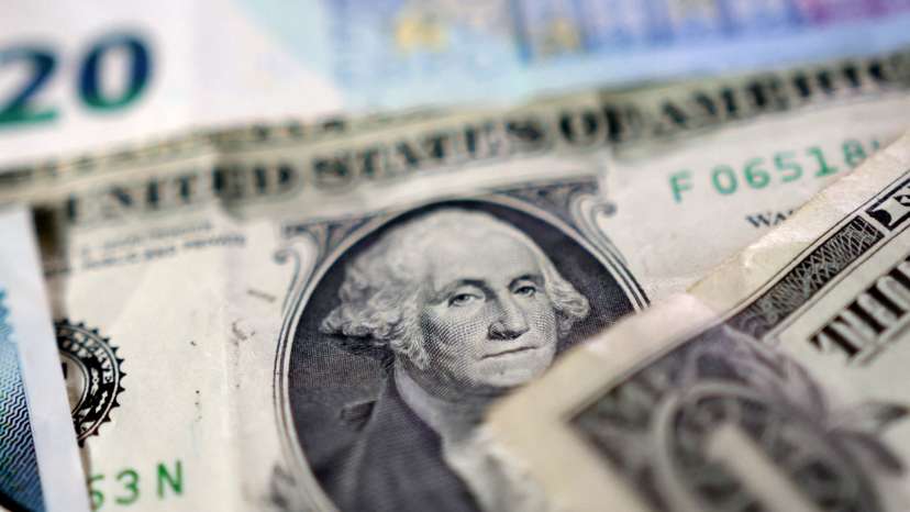 Illustration shows U.S. dollar banknotes