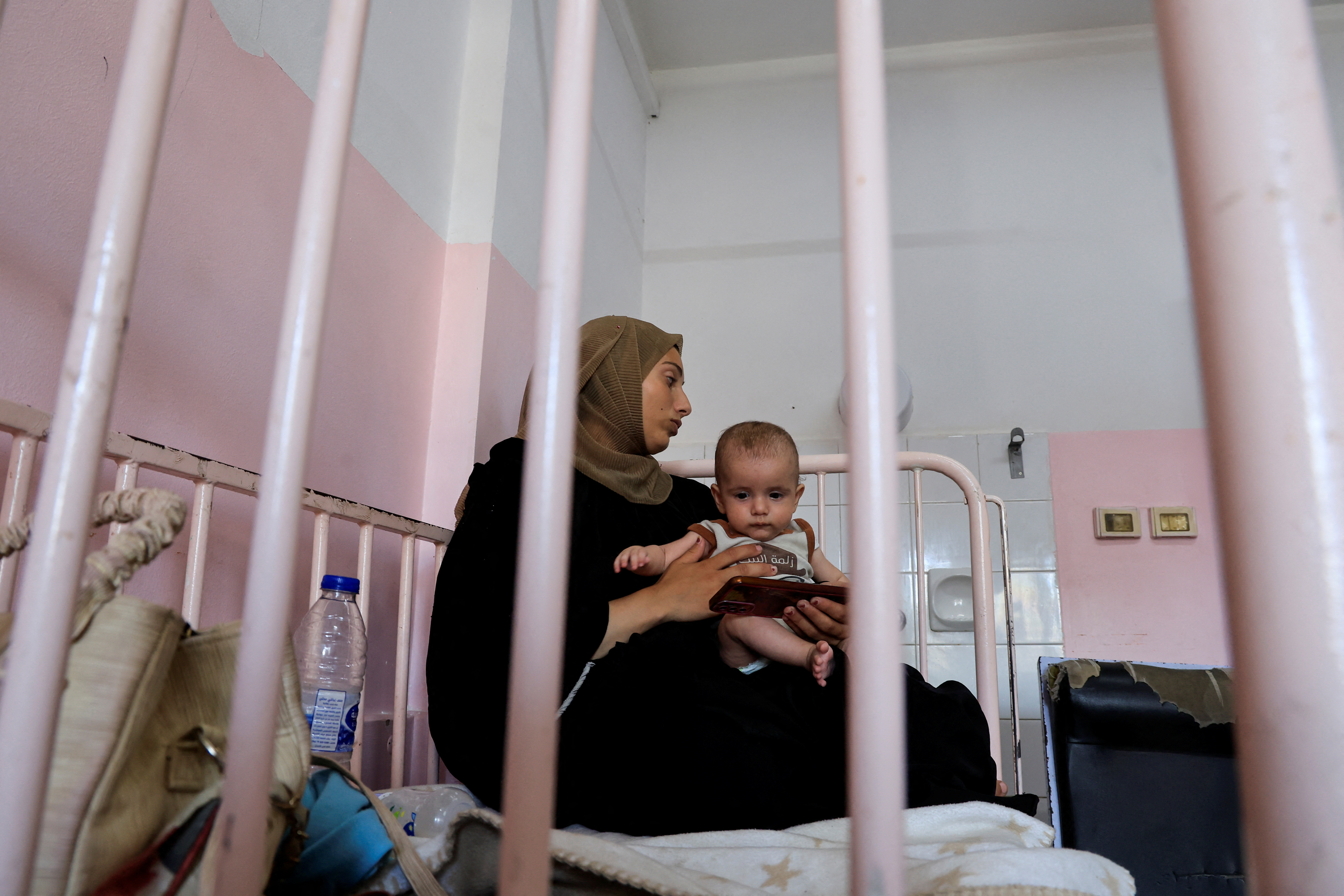 Palestinian children infected with meningitis receives treatment at Nasser hospital, in Khan Younis