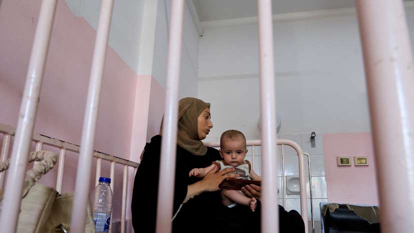 Palestinian children infected with meningitis receives treatment at Nasser hospital, in Khan Younis