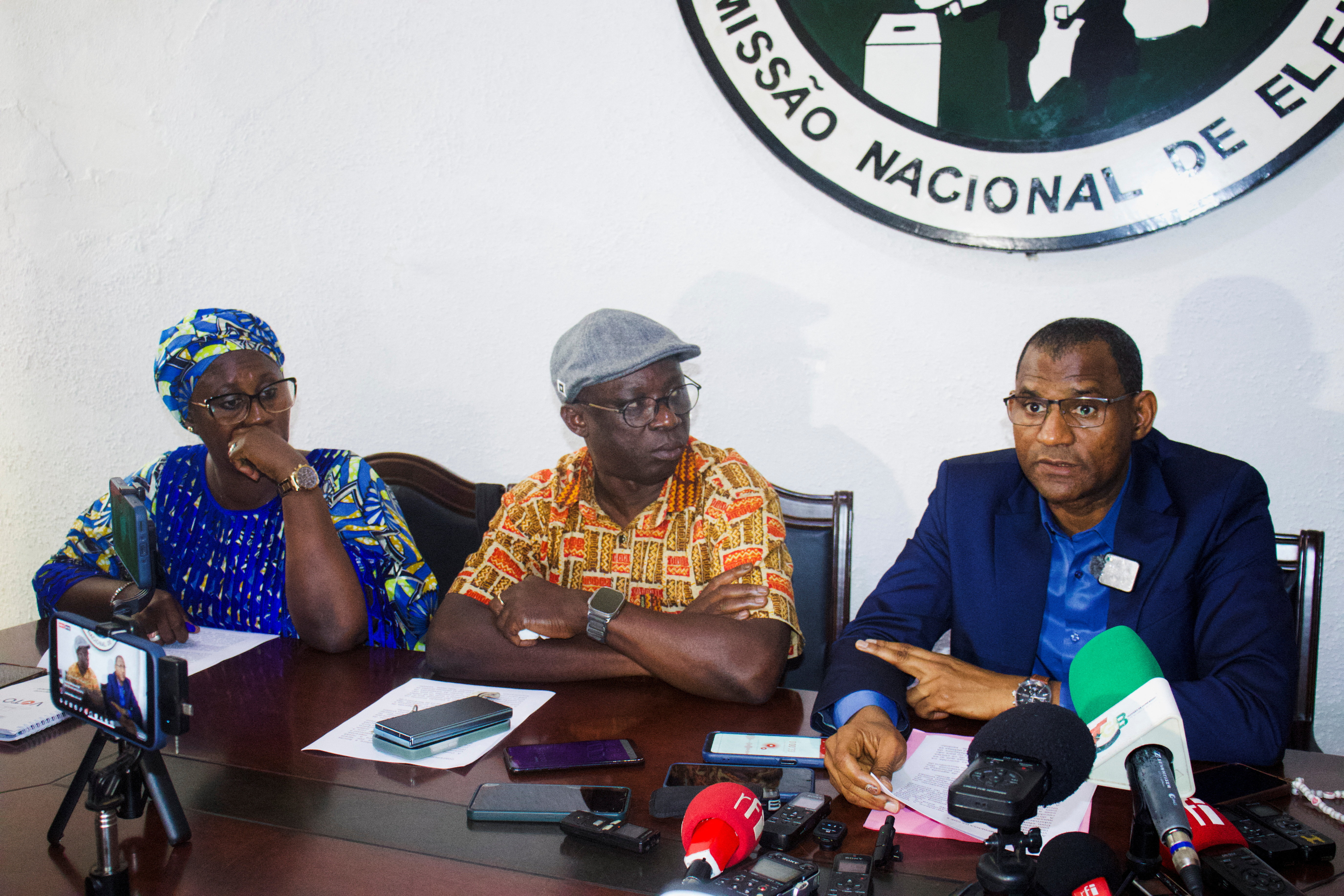 Officials of Guinea-Bissau's electoral commission address the media in Bissau, Guinea-Bissau