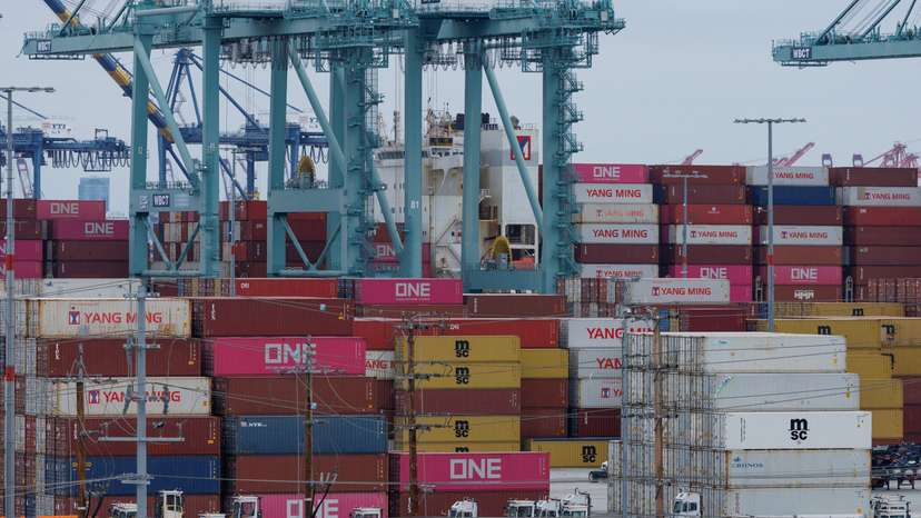 FILE PHOTO: A container ship is unloaded at the Port of Los Angeles, in San Pedro