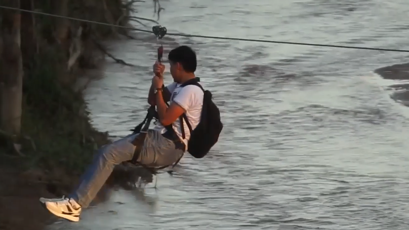 Bolivia village cut off after floods, residents use zipline