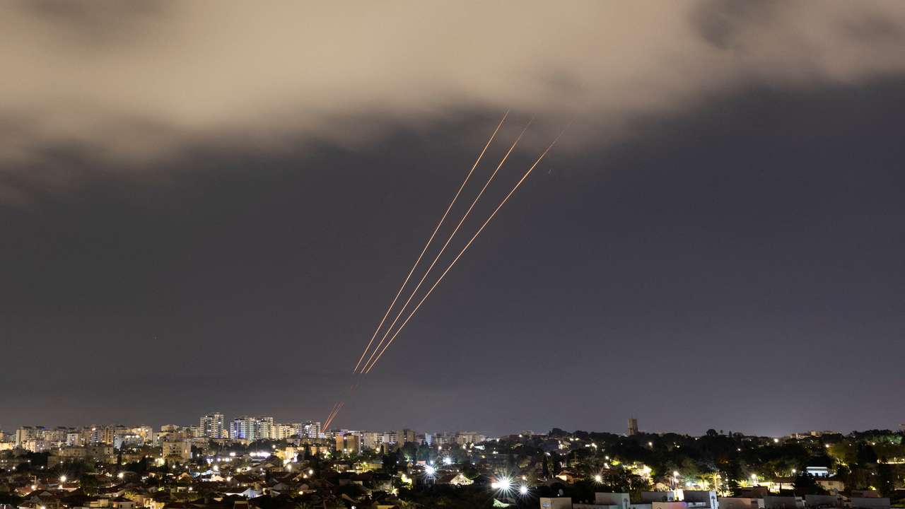 An anti-missile system operates after Iran launched drones and missiles towards Israel, as seen from Ashkelon