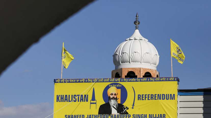 A banner with the image of Sikh leader Hardeep Singh Nijjar is seen at the Guru Nanak Sikh Gurdwara temple, site of his June 2023 killing, in Surrey