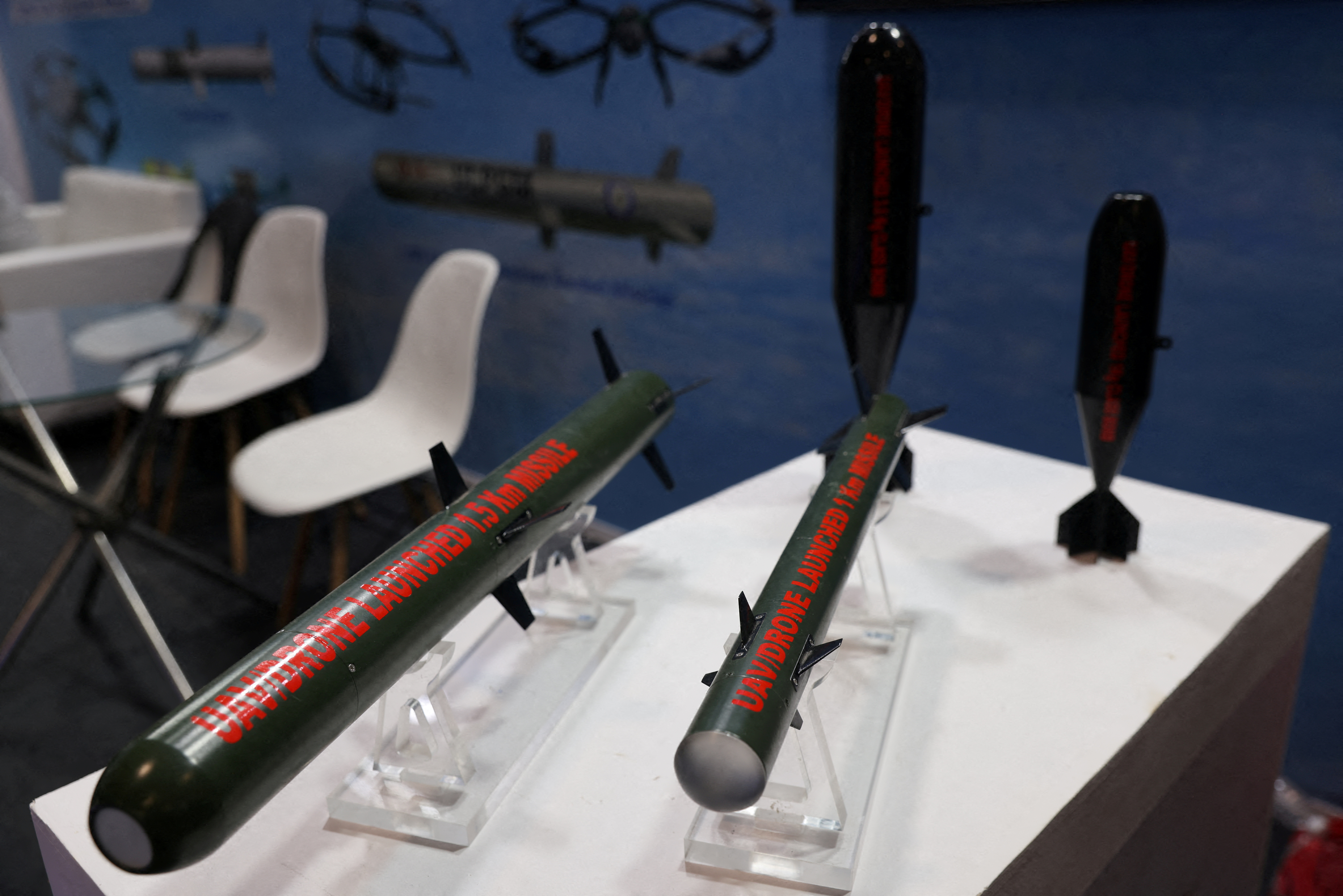 FILE PHOTO: A view shows model missiles used in drones developed by Bharat Dynamics Limited, kept on display at their stall at the drone exhibition at Bharat Drone Shakti 2023