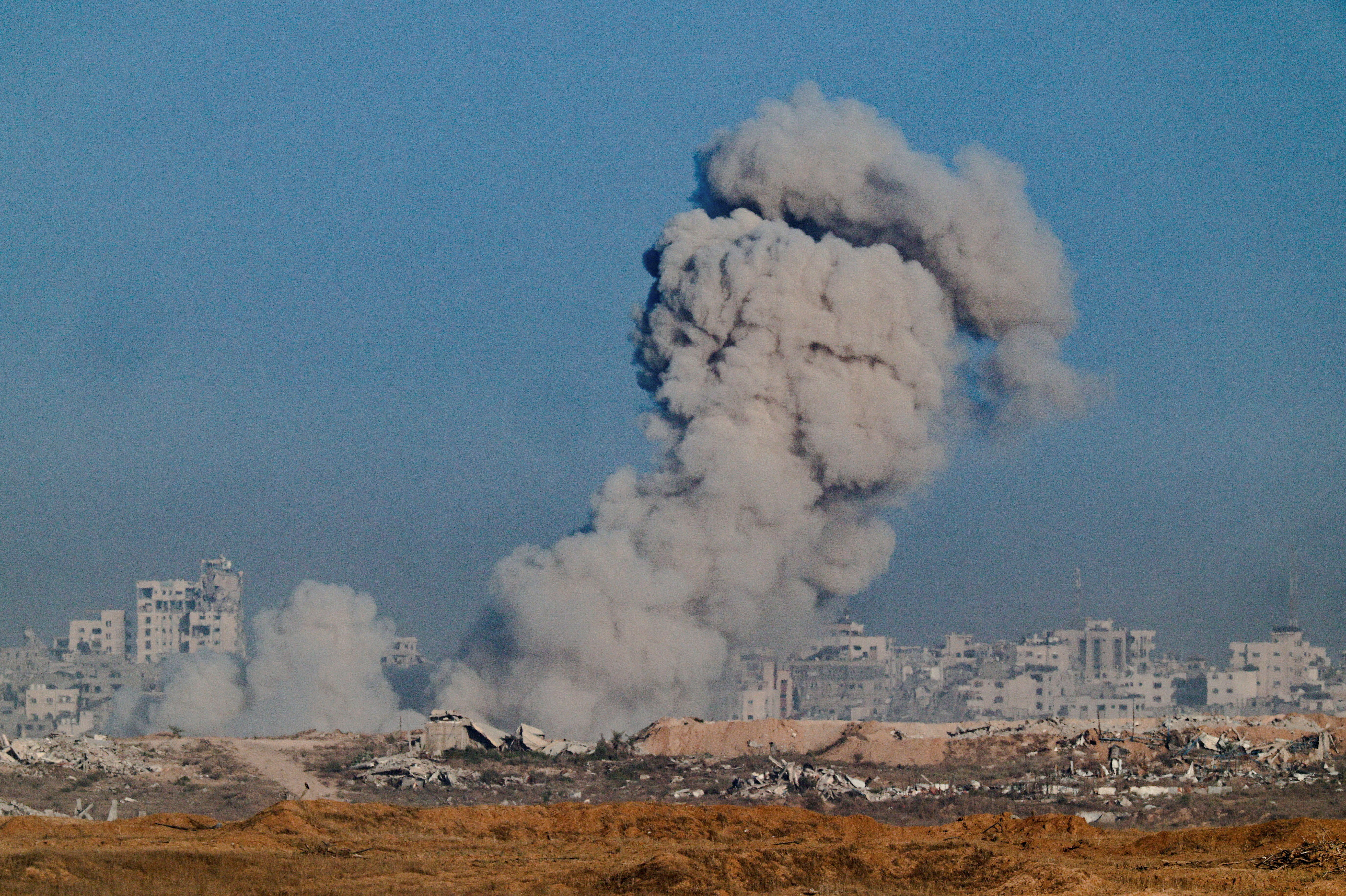 Smoke rises from Gaza after an explosion