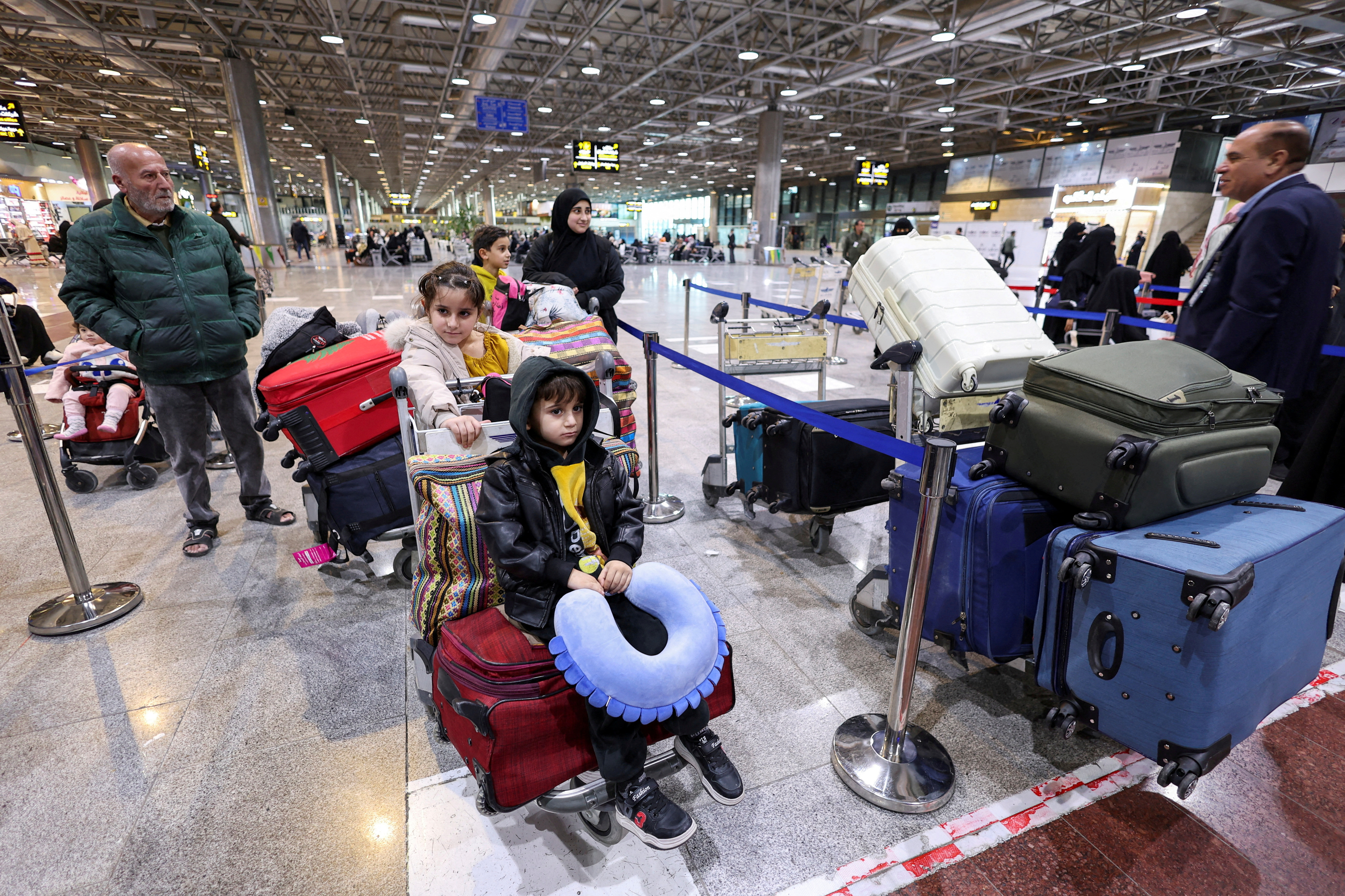FILE PHOTO: Displaced Lebanese, who had fled to Iraq, prepare to head back home after a ceasefire between Israel and Hezbollah took effect, in Najaf