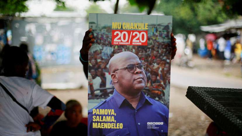 FILE PHOTO: Congoleses wait for full provisional results of presidential election in Kinshasa