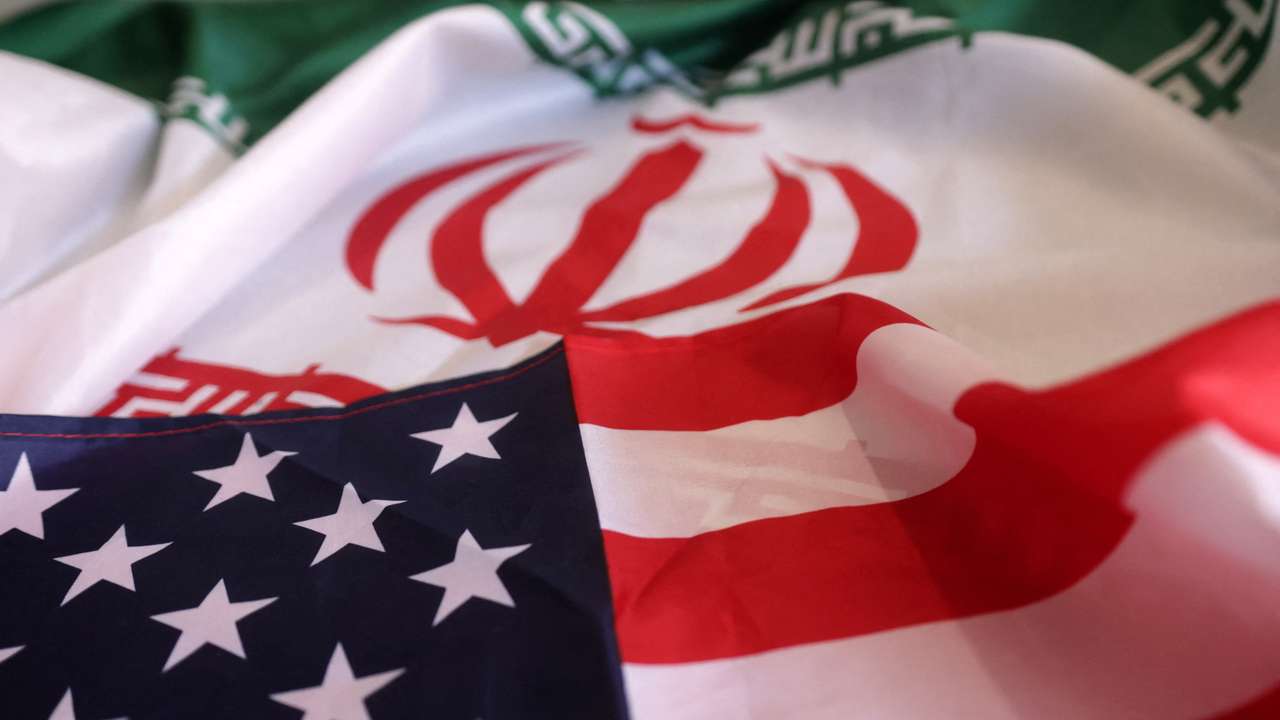 Illustration shows USA and Iranian flags