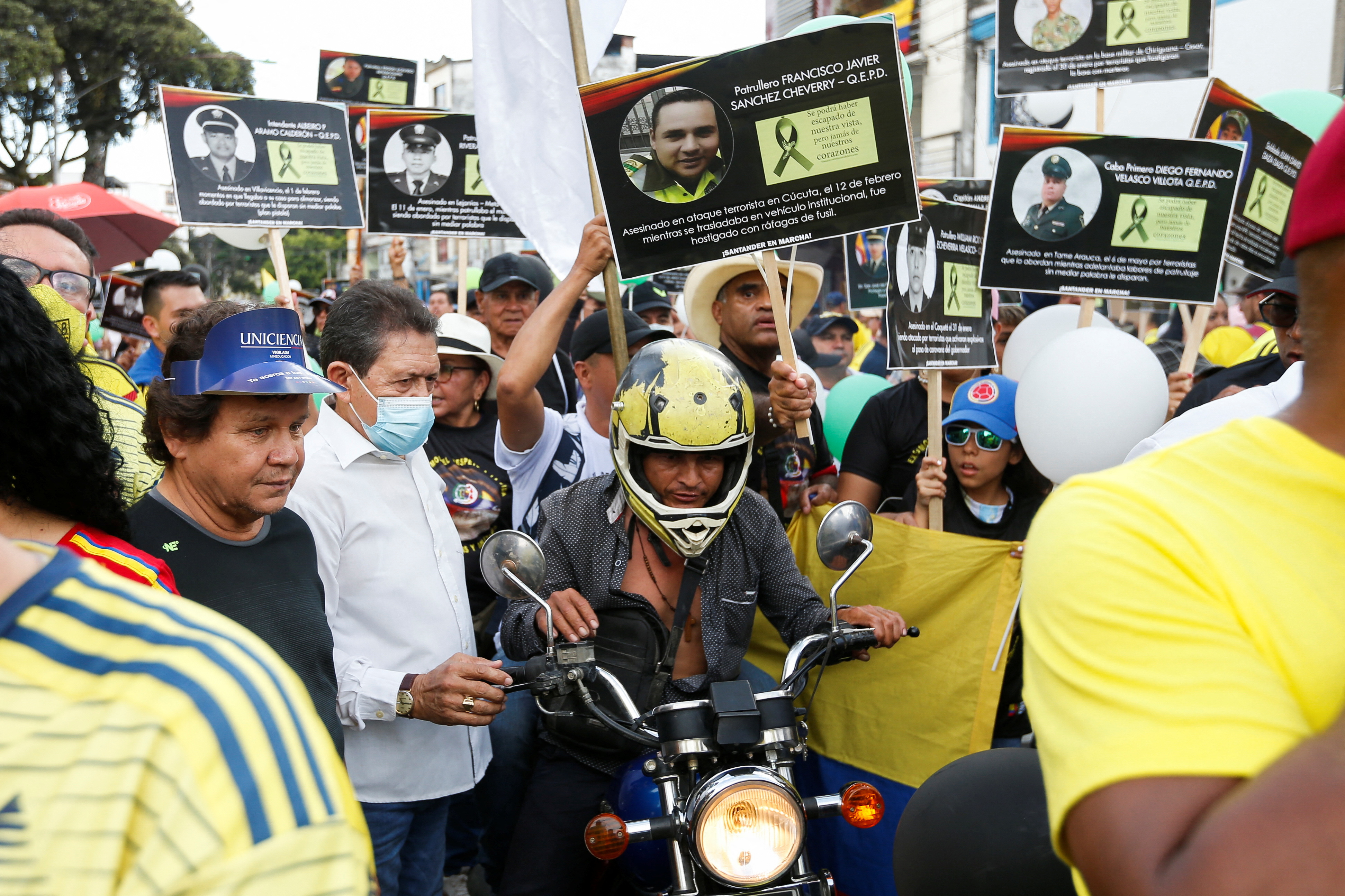 People protest against the killings of police officers by the Clan Del Golfo criminal gang, according to authorities, in Bucaramanga