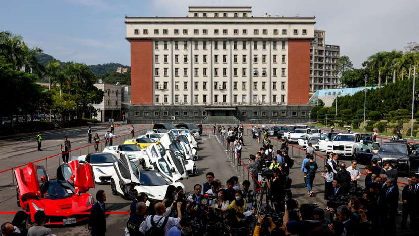 Luxury cars on display as Taiwan auctions off luxury cars linked to the Cambodian scam centre Prince Group, in Taipei