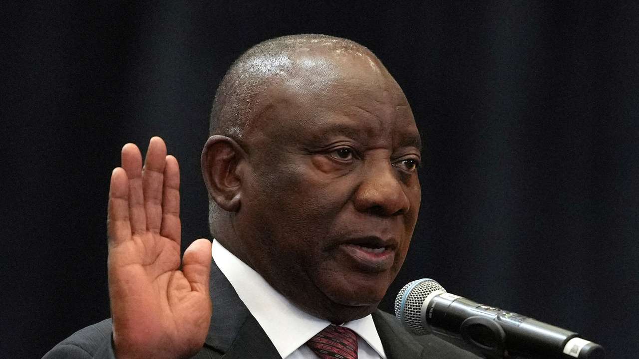 FILE PHOTO: South African President Cyril Ramaphosa is sworn into the National Assembly during the first sitting of the National Assembly following elections