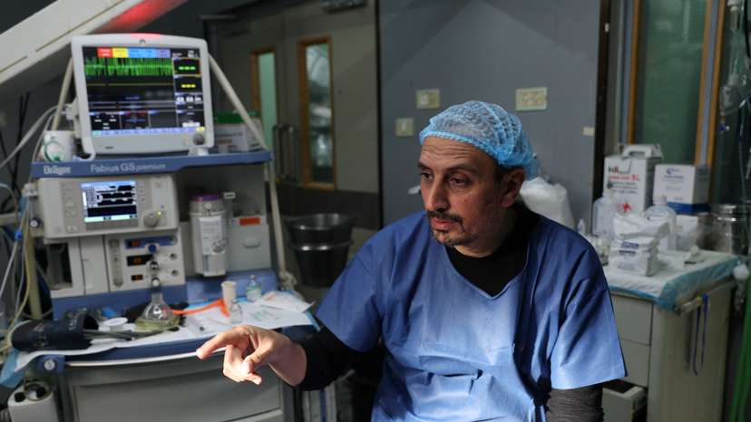 Palestinian doctor Ahmed Al-Mughraby speaks to Reuters at Gaza European Hospital in Khan Younis