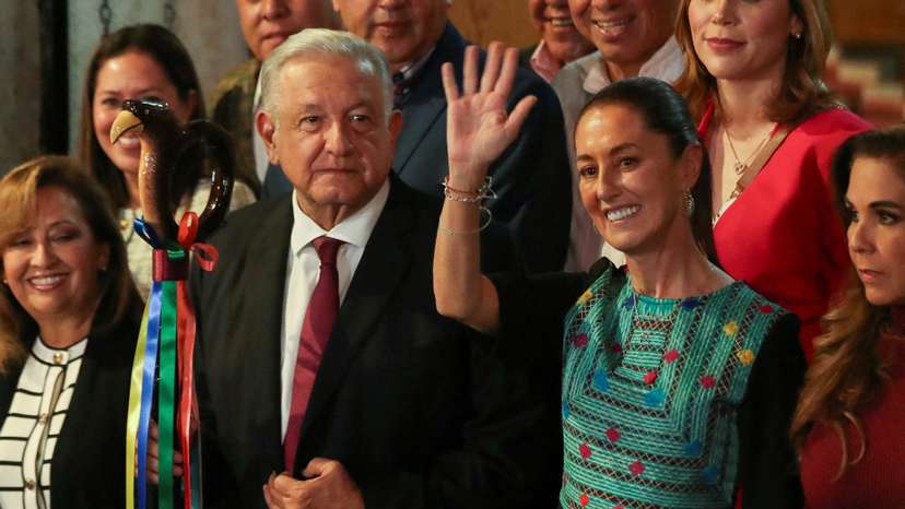 FILE PHOTO: Mexico's President Andres Manuel Lopez Obrador hands over the "baton of command" to Claudia Sheinbaum