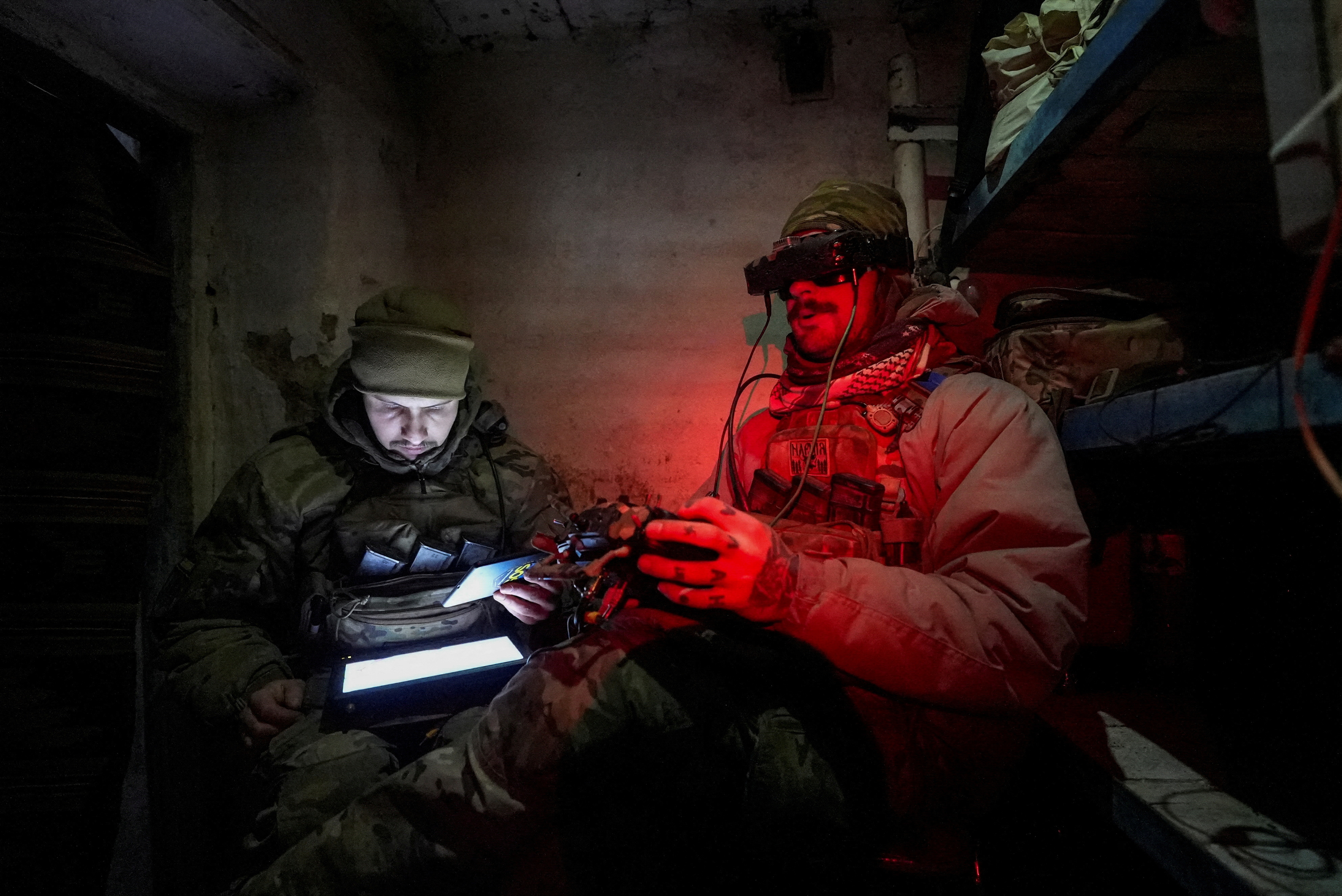 FILE PHOTO: Ukrainian servicemen operate a first person view (FPV) drone at a position near the town of Horlivka