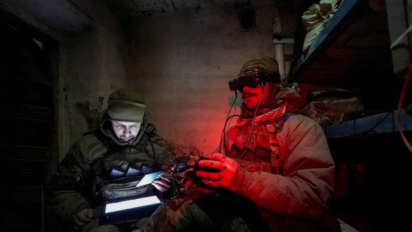 FILE PHOTO: Ukrainian servicemen operate a first person view (FPV) drone at a position near the town of Horlivka