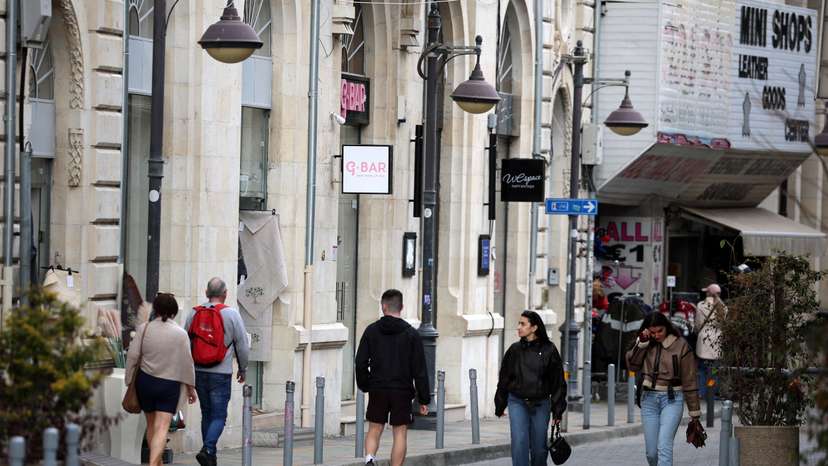 People walk in the coastal city of Limassol