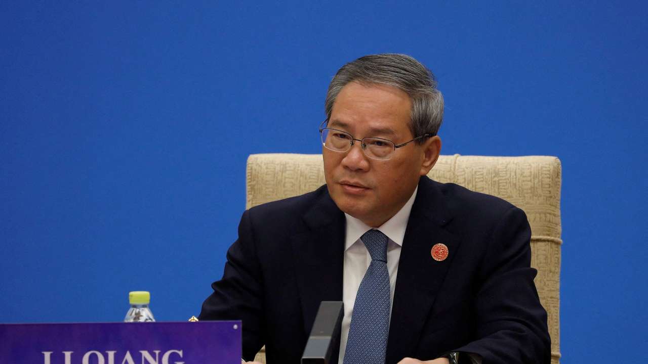 FILE PHOTO: Chinese Premier Li Qiang attends an economic conference in Beijing