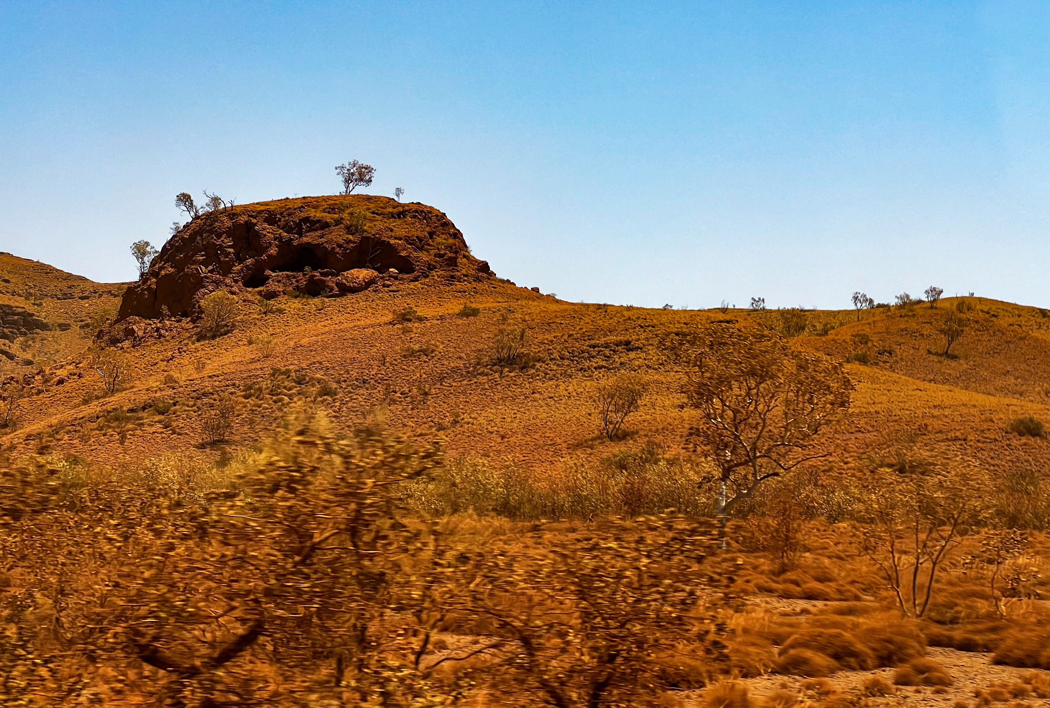 A rocky outcrop holds an Aboriginal shelter of significance in the Pilbara region of Western Australia