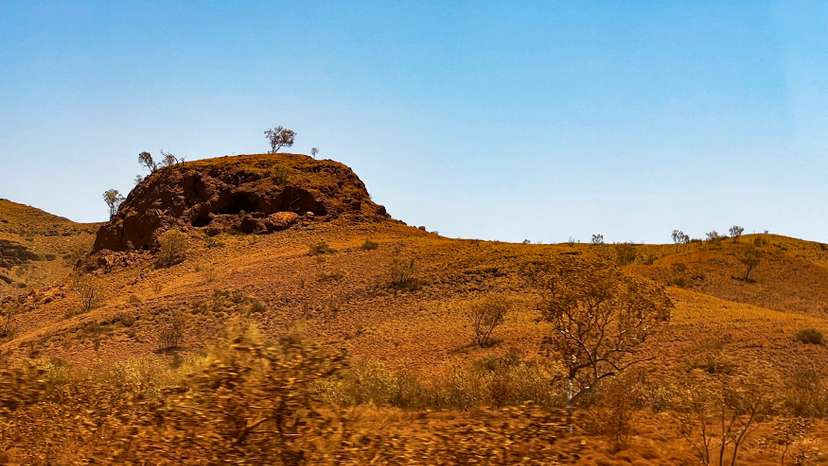 A rocky outcrop holds an Aboriginal shelter of significance in the Pilbara region of Western Australia