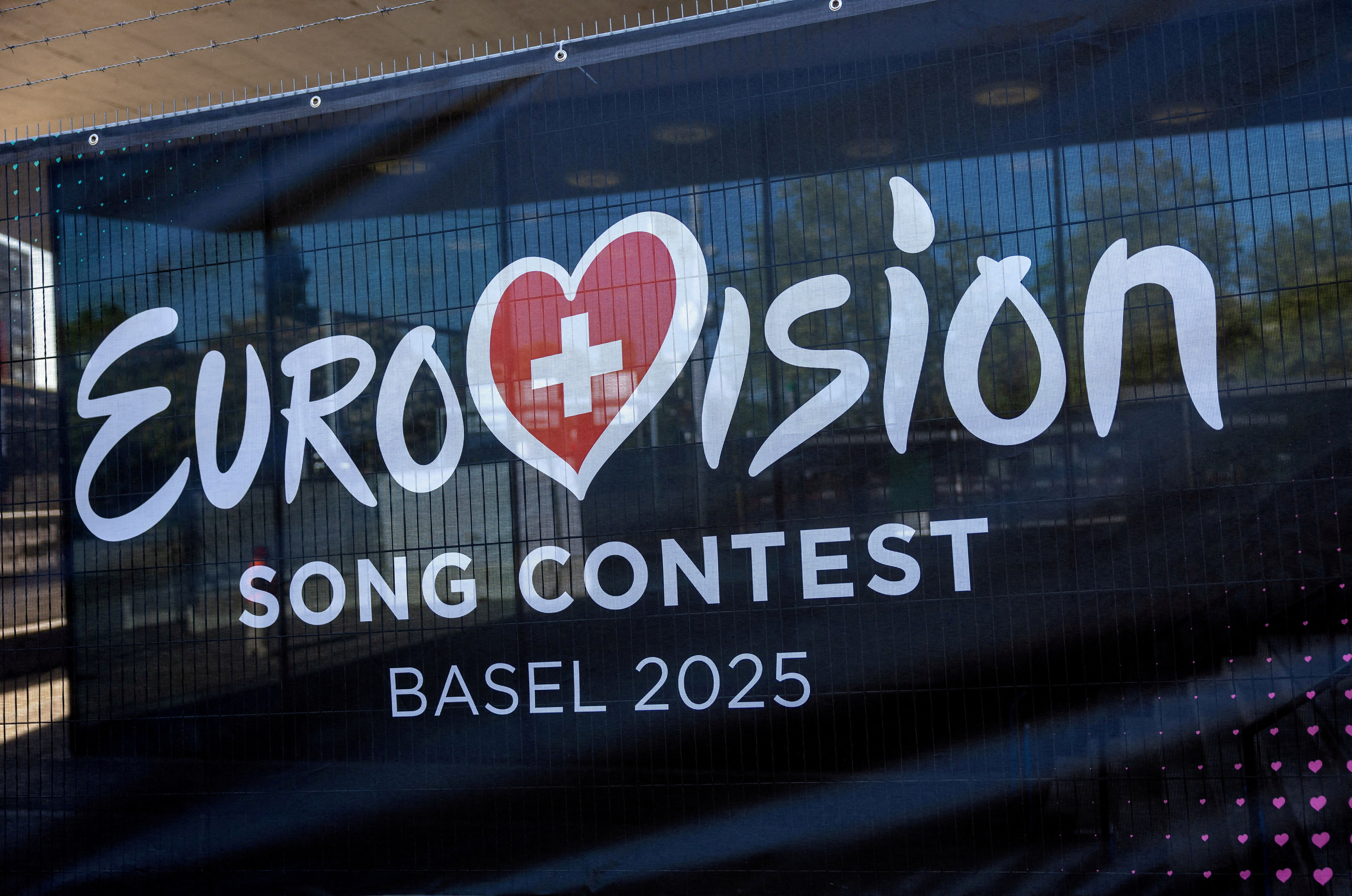FILE PHOTO: A logo of the Eurovision Song Contest is seen in front of the St. Jakobshalle in Basel