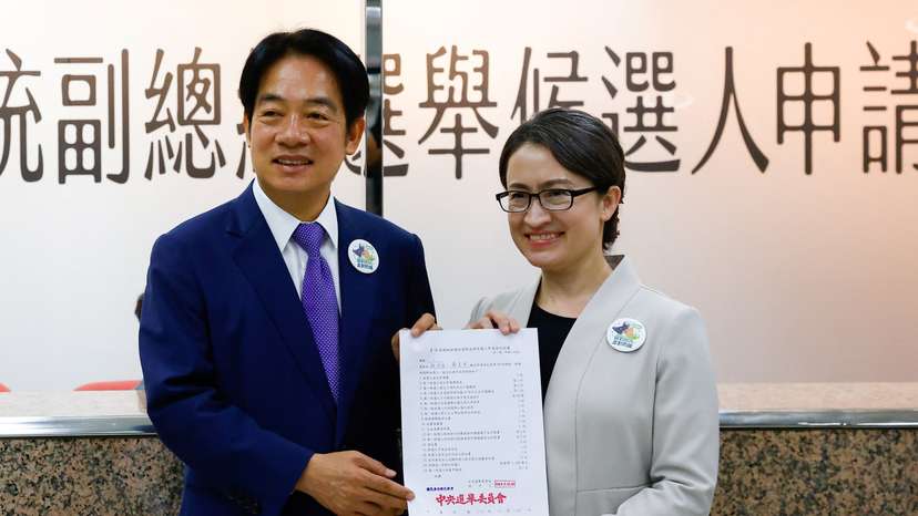 Taiwan's Vice President Lai Ching-te and running mate Hsiao Bi-Khim pose for a photo after registering for the upcoming presidential election, in Taipei