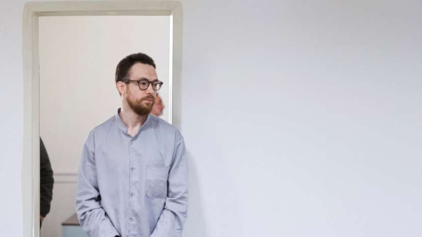 Swedish EU employee Johan Floderus attends a court session in Tehran
