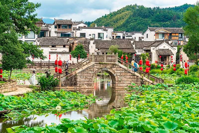 Village tourism in Huangshan Mountain in Anhui Province revitalises traditional architecture and allows visitors to experience local ways of life.