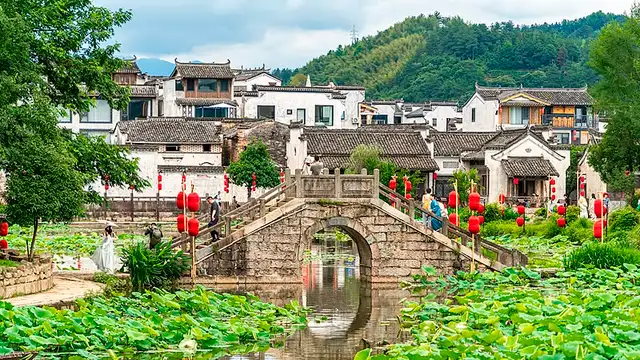 Village tourism in Huangshan Mountain in Anhui Province revitalises traditional architecture and allows visitors to experience local ways of life.