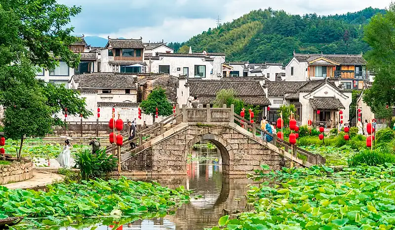 Village tourism in Huangshan Mountain in Anhui Province revitalises traditional architecture and allows visitors to experience local ways of life.
