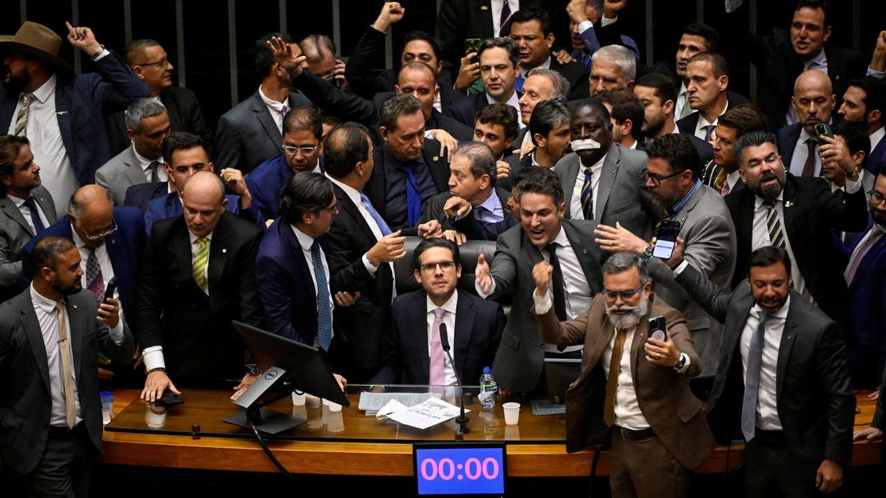 Allies of former president Bolsonaro block the resumption of sessions at the Chamber of Deputies after the mid-year recess in protest against his house arrest, in Brasilia