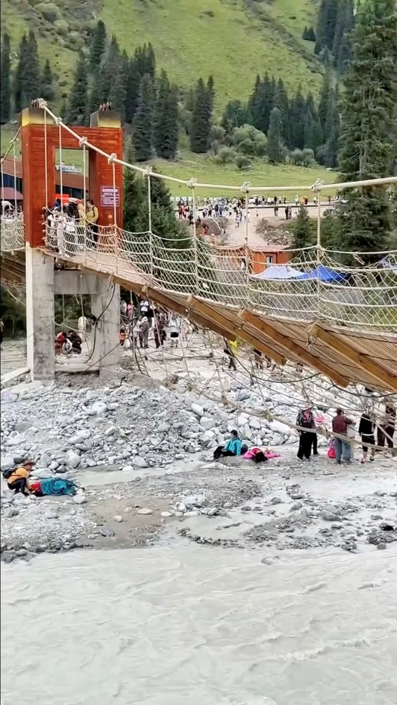 Aftermath of a suspension bridge collapse in Yili, Xinjiang Uyghur Autonomous Region