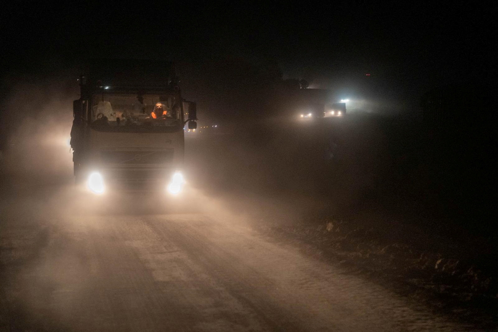 Israeli army handout image shows trucks containing humanitarian aid from WFP in a location given as northern Gaza strip