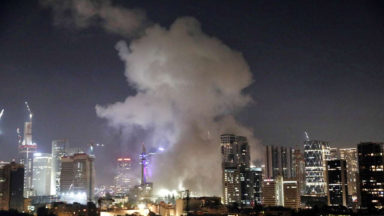 Smoke billows following missile attack from Iran on Israel, at Tel Aviv, Israel