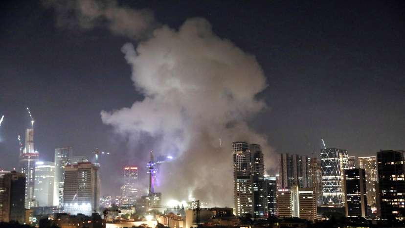Smoke billows following missile attack from Iran on Israel, at Tel Aviv, Israel