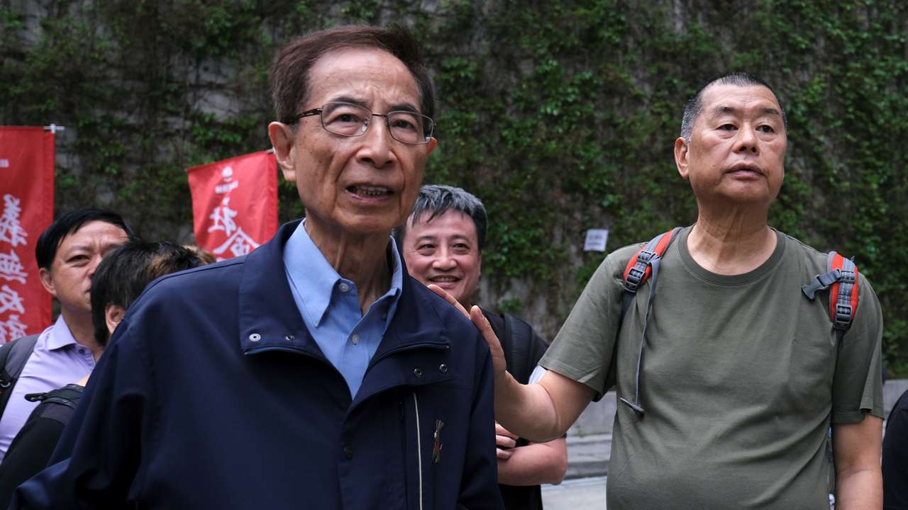 Hong Kong politician Martin Lee and Founder of Next Media Jimmy Lai march during a protest to demand authorities scrap a proposed extradition bill with China, in Hong Kong