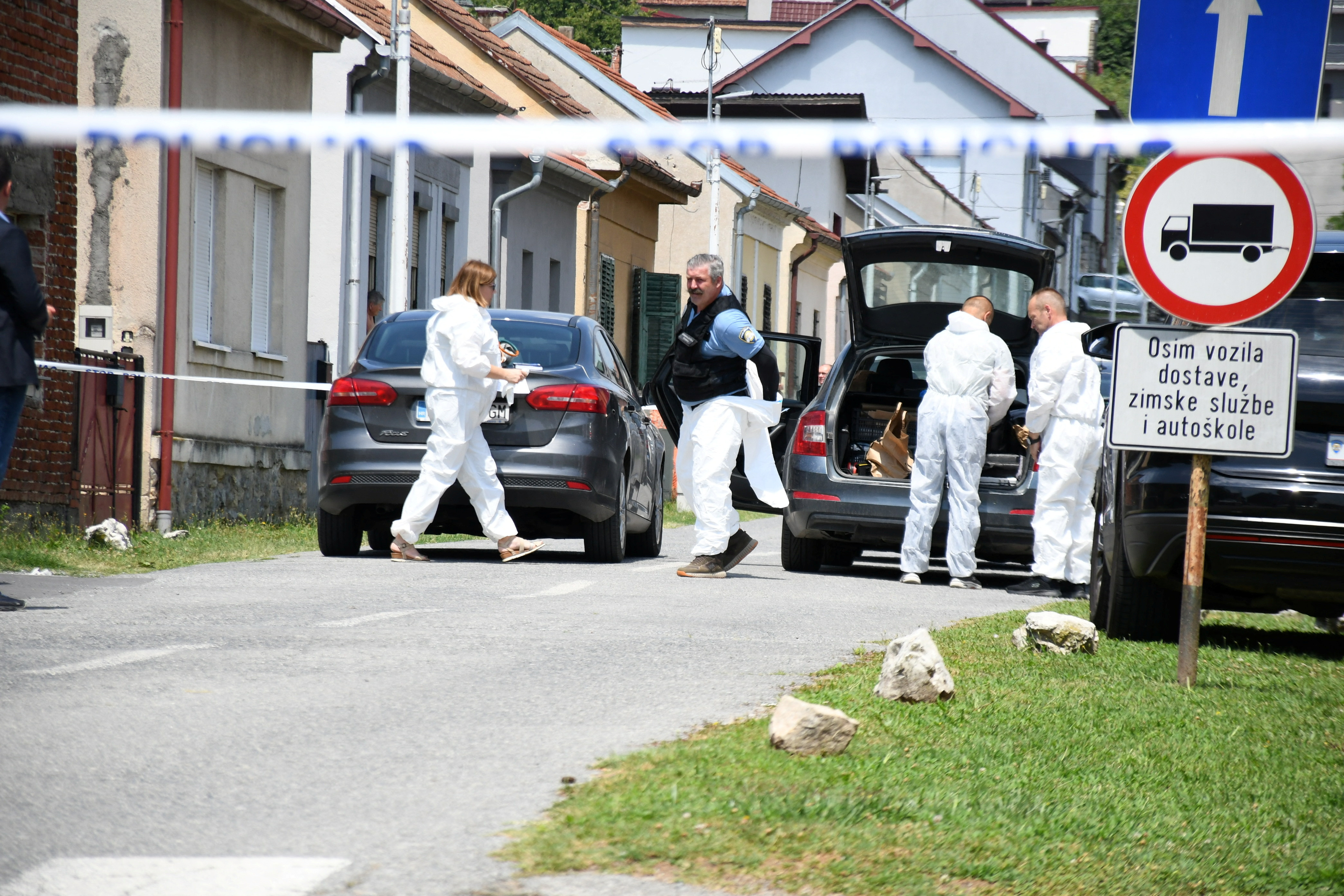 Police secure a crime scene in Daruvar